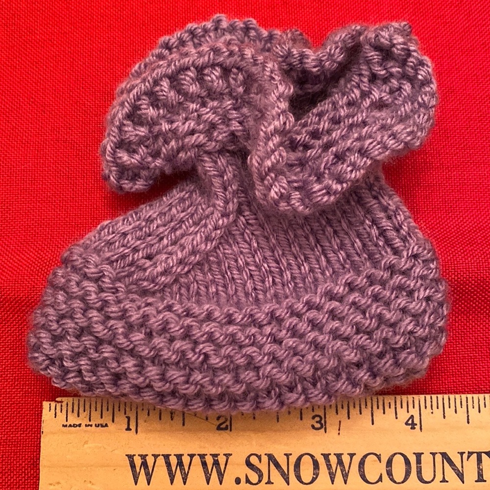 Hand knit baby booties.